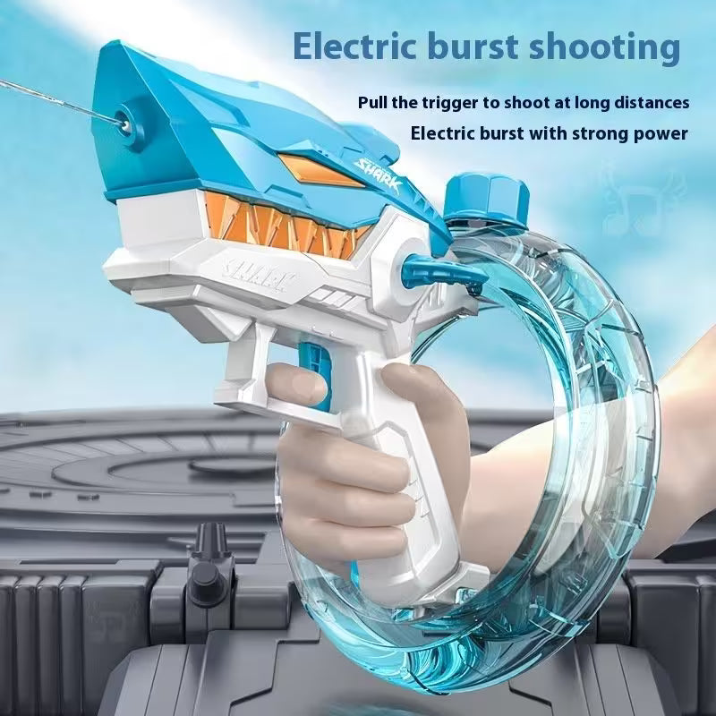 Blue and white water gun with electric burst feature held by a hand against a clear blue sky.