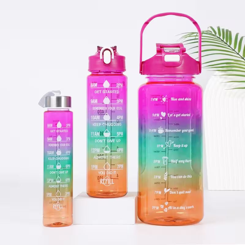 Gradient water bottles with motivational text on a white background