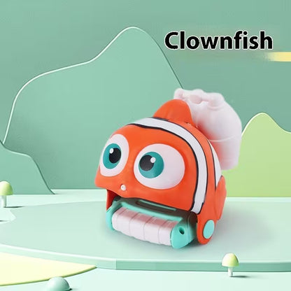 Toy clownfish with a green background