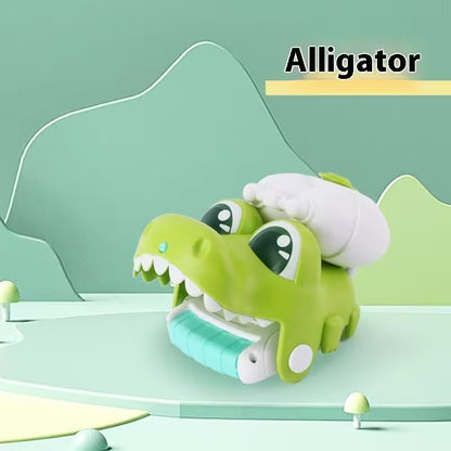 Toy alligator with a child on its back against a light green background