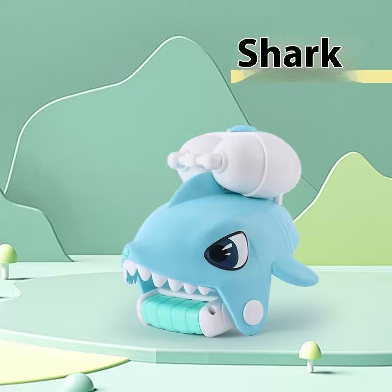 Toy shark with a white hat on a green background