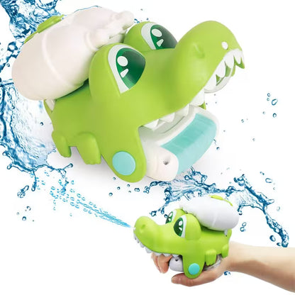 Green dinosaur-shaped water gun with water splashes on a white background