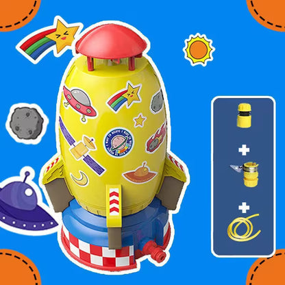 Toy rocket with stickers on a blue background with space-themed elements