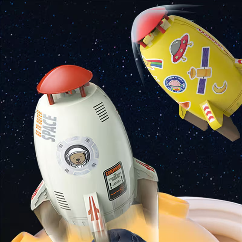 Toy rocket ship with space-themed stickers against a starry space background