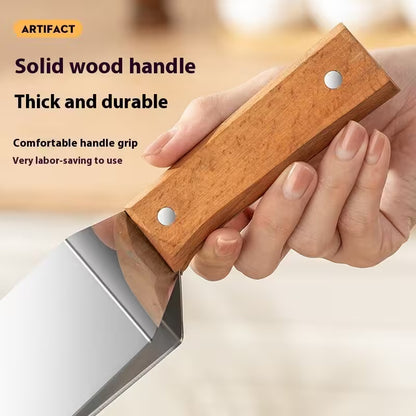 Hand holding a knife with a wooden handle, emphasizing durability and comfort.