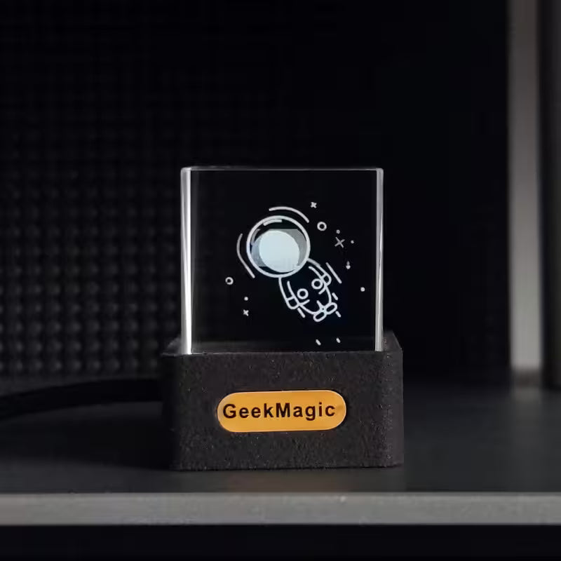 GeekMagic 3D laser engraving block with astronaut design on a black background