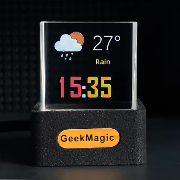 Digital clock with weather display and time on a black background, branded 'GeekMagic'.