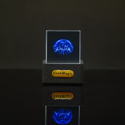 GeekMagic LED display with jellyfish design on a dark background