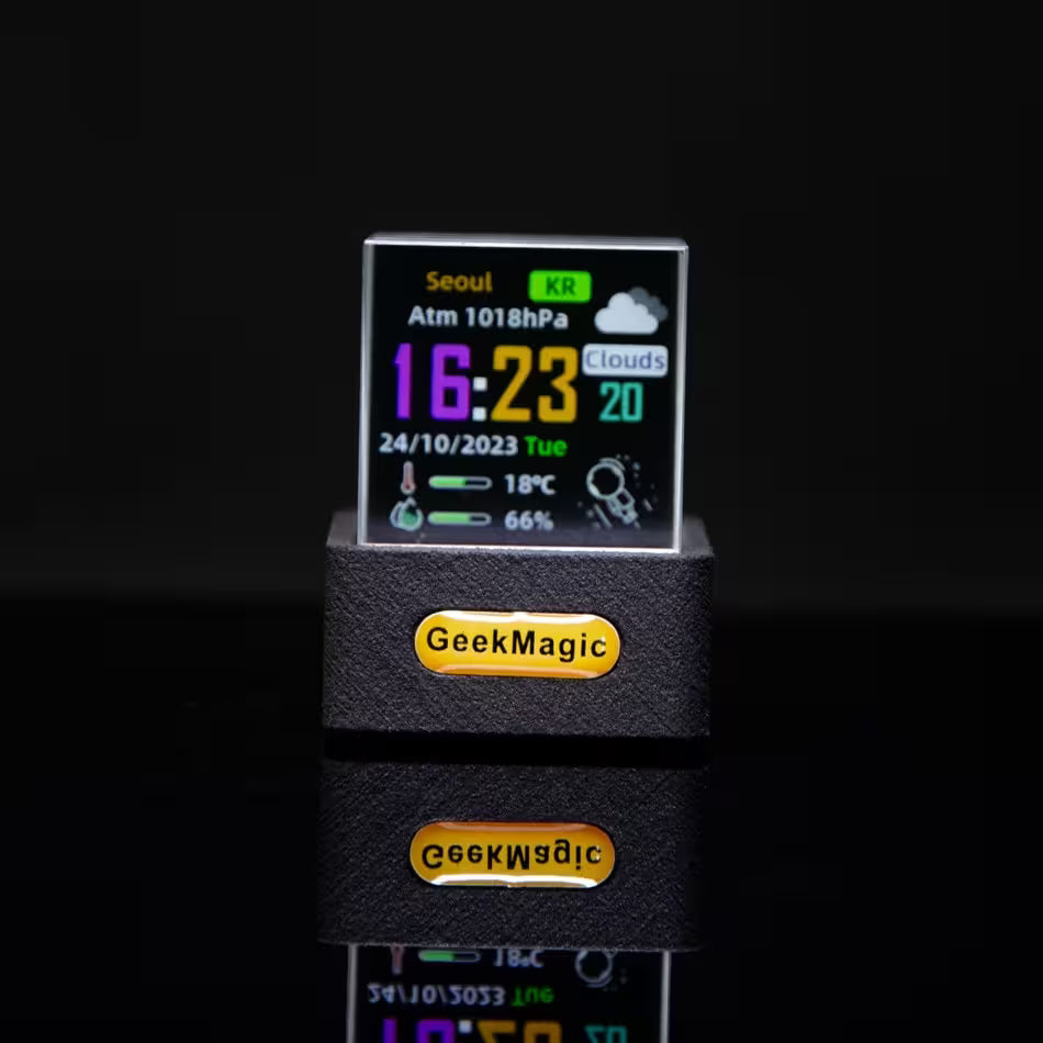 Digital clock with weather display and 'GeekMagic' branding on a black background