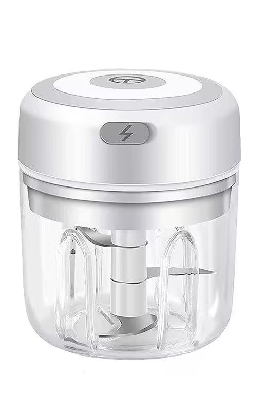 White handheld food chopper with clear container on a white background