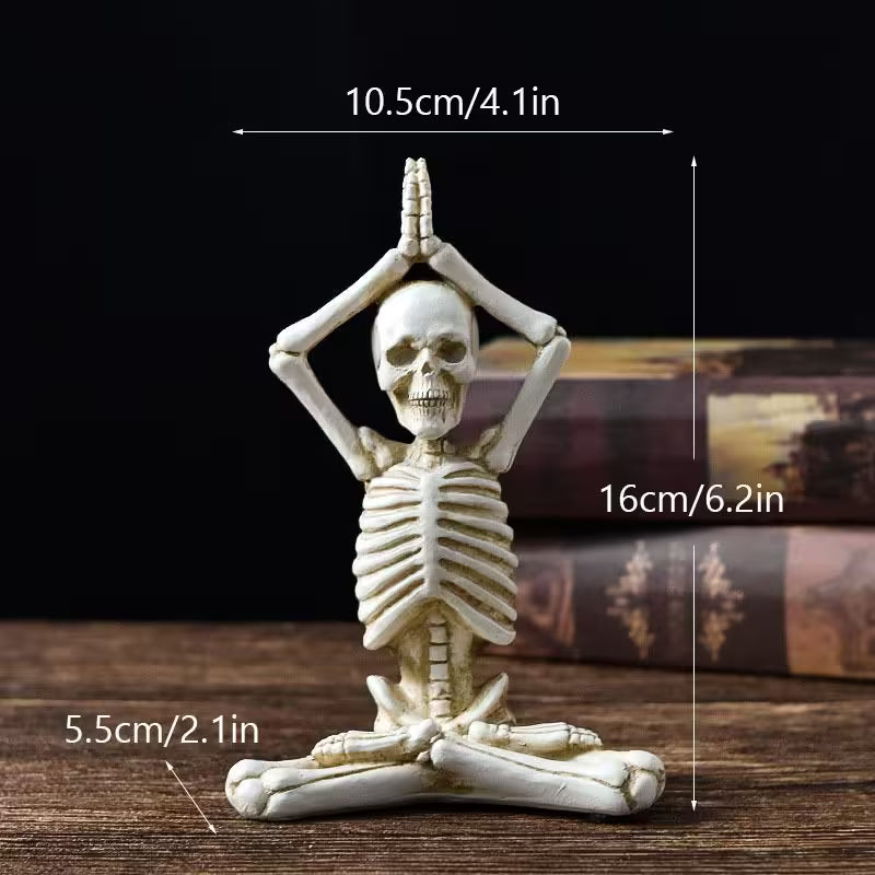 Yoga skeleton figurine with measurements on a dark background