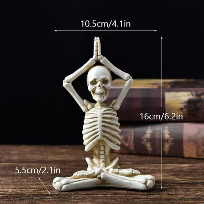 Yoga skeleton figurine with measurements on a dark background