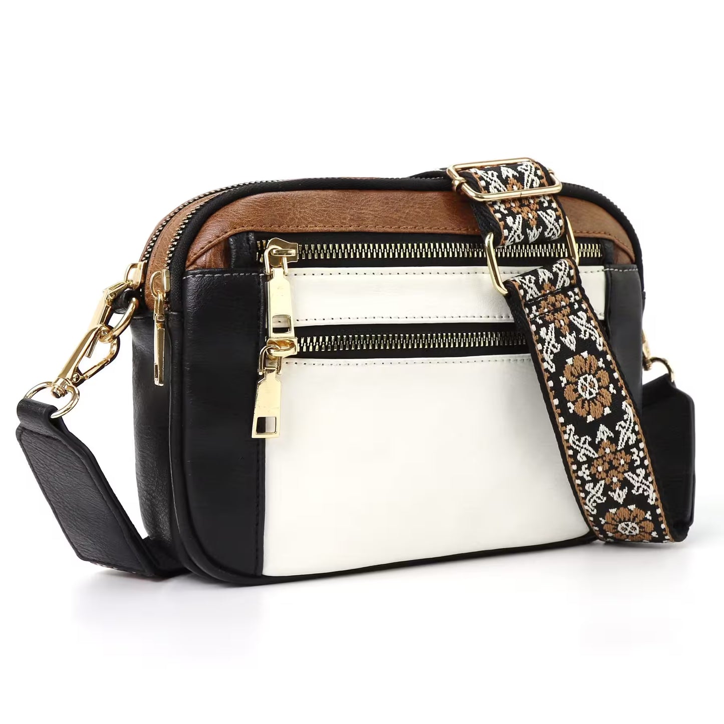 Multicolored handbag with a patterned strap on a white background