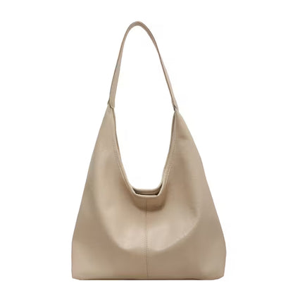 Beige handbag on a white background