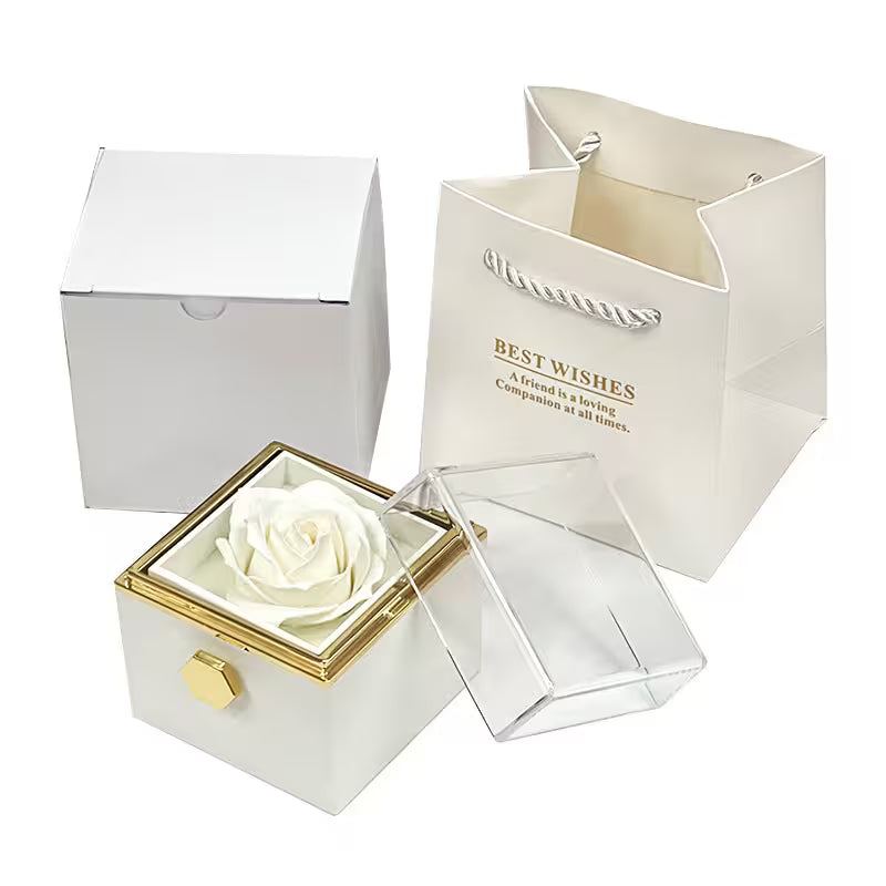 White rose in a decorative box with 'Best Wishes' message on a white background