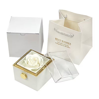 White rose in a decorative box with 'Best Wishes' message on a white background