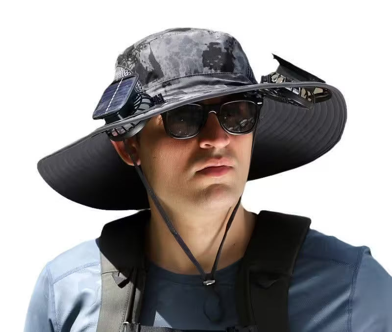 Person wearing a wide-brimmed camouflage hat with a solar panel on a white background