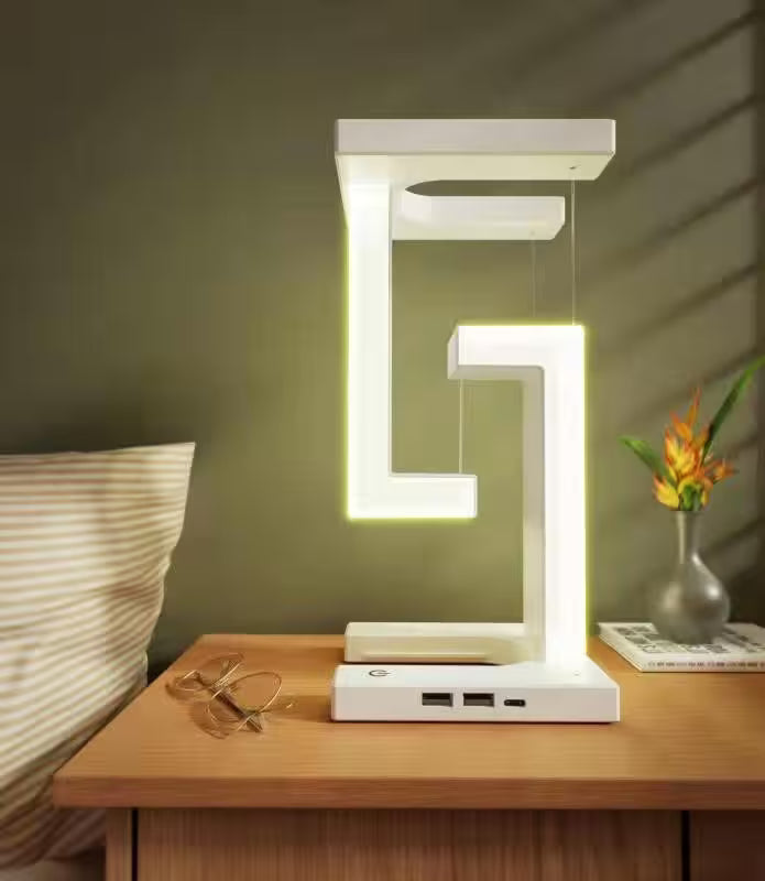 Modern LED table lamp on a wooden nightstand with a cozy room setting.
