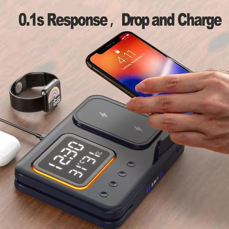 Wireless charging station with smartphone, smartwatch, and earbuds on a wooden surface.
