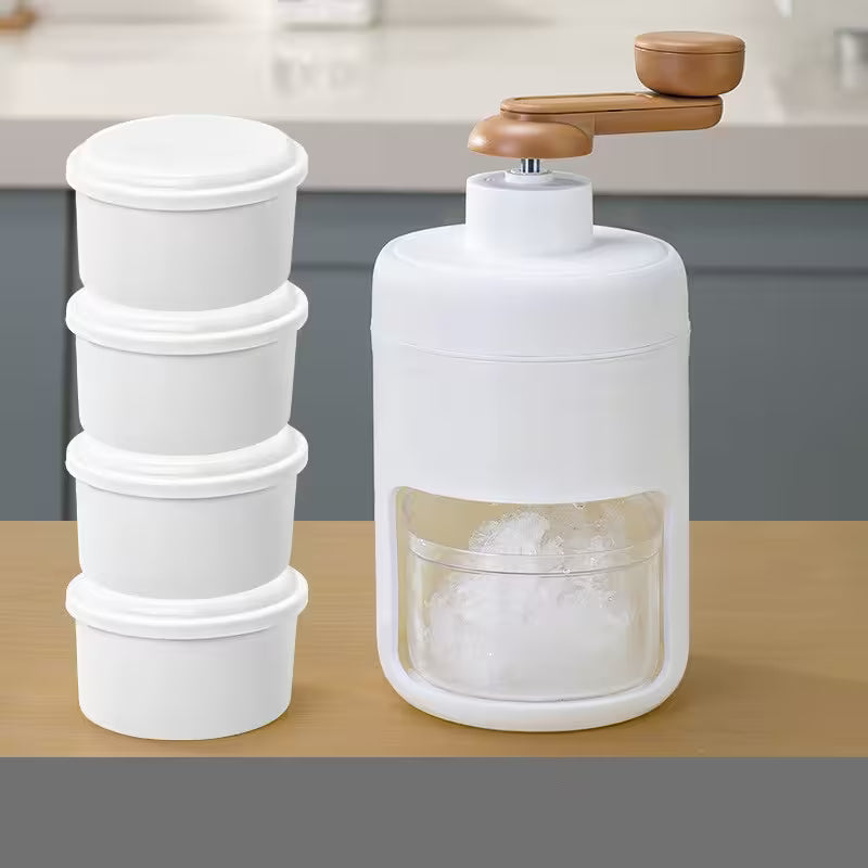 White kitchen grinder with wooden top on a wooden surface, with white containers stacked beside it.