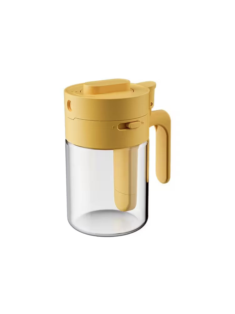 Yellow glass coffee maker with handle on a white background