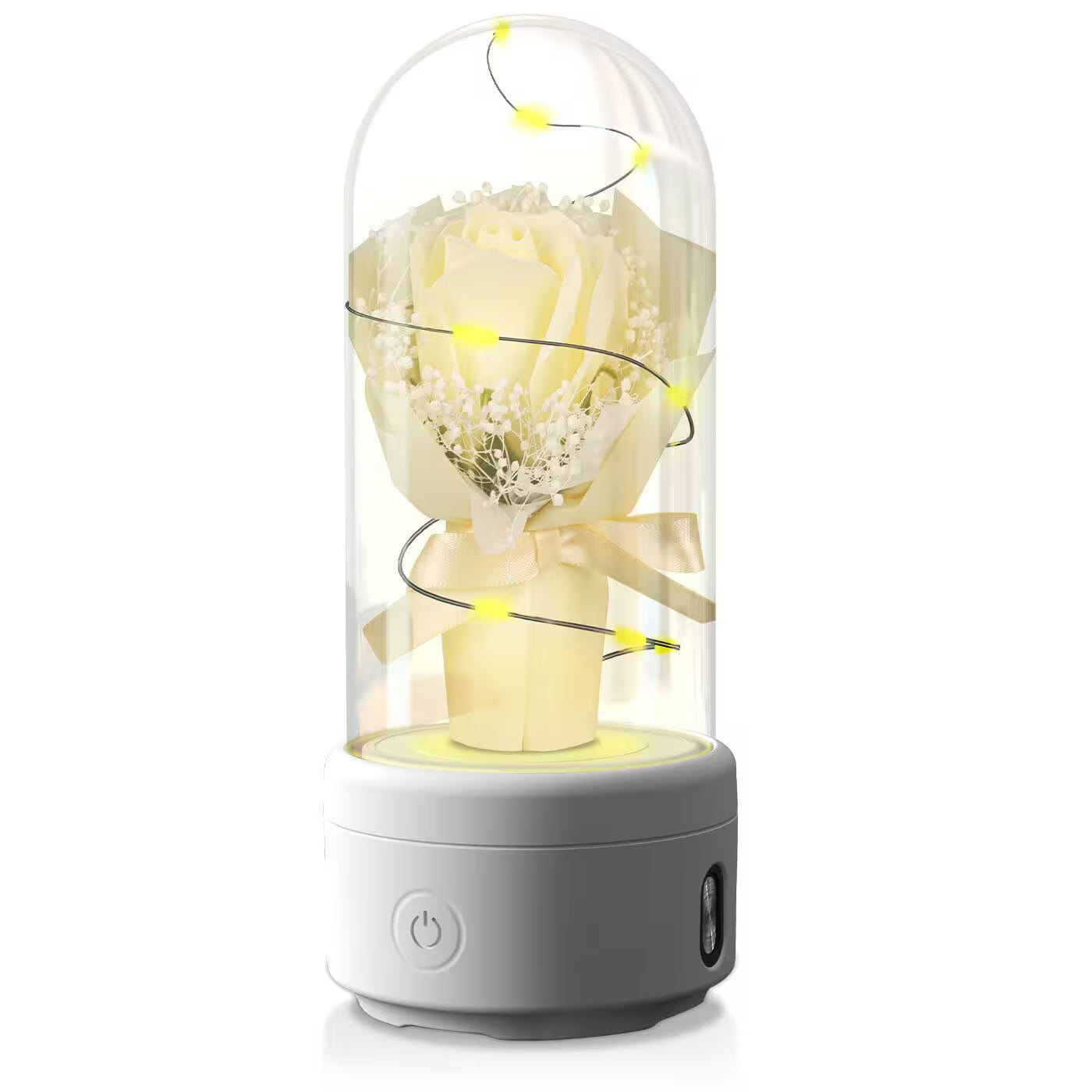 Decorative lamp with flowers inside a glass dome on a white background